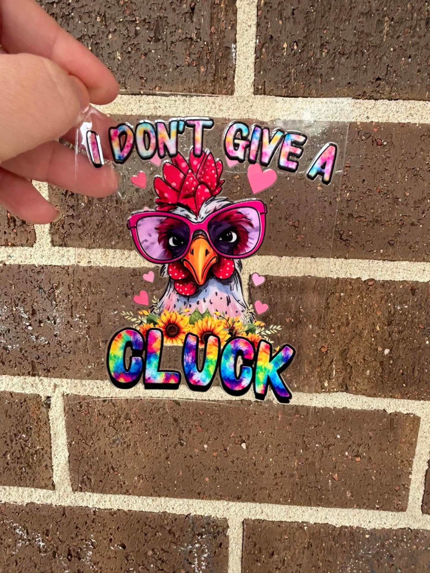 CLUCK- DOUBLE SIDED DECAL.