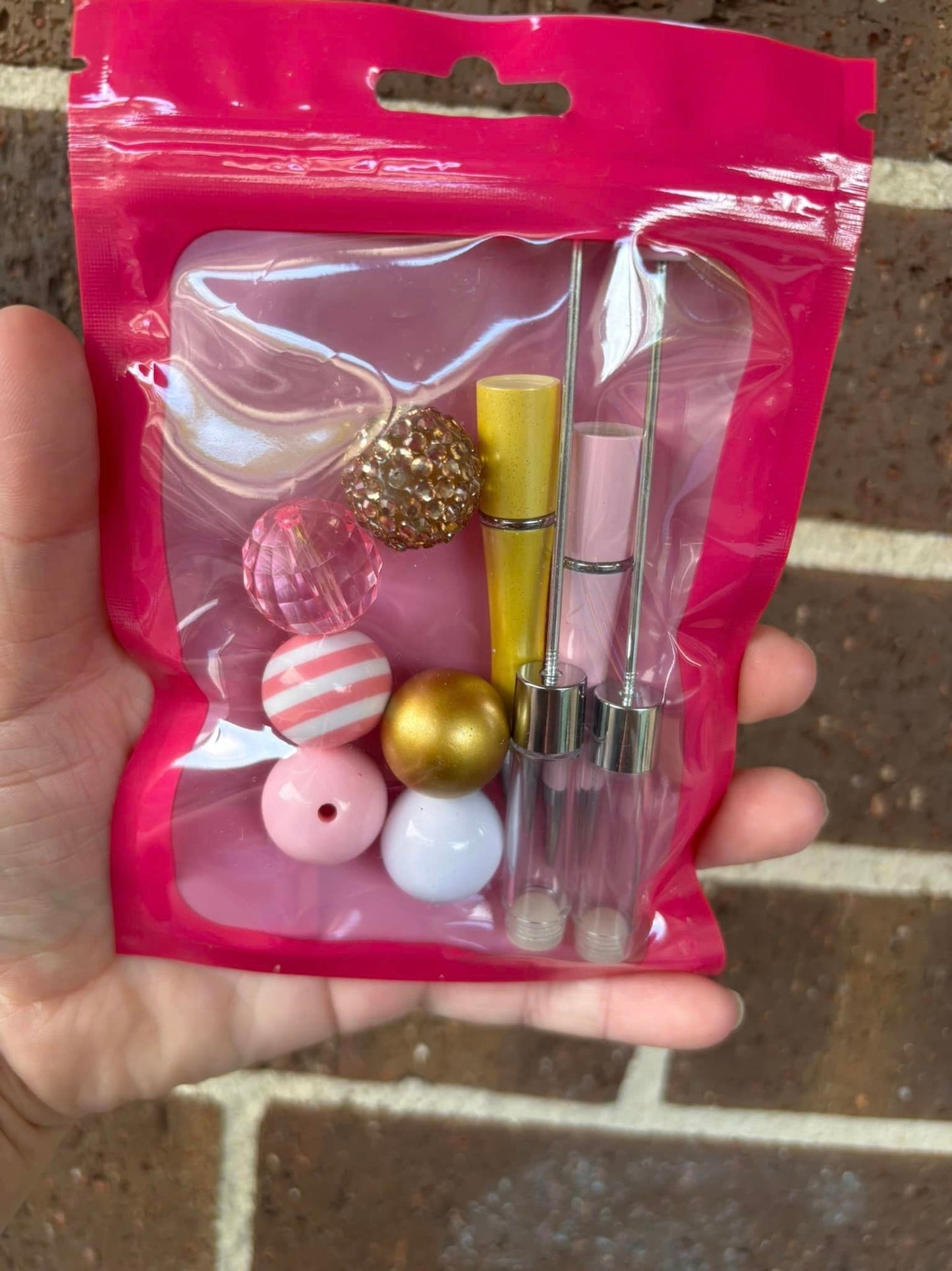 PINK AND GOLD SNOW GLOBE PEN SET